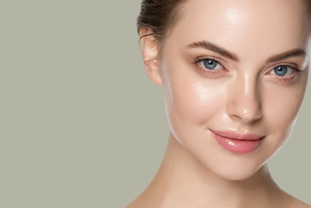 Woman with glowing skin showing the effects of med spa PDO threads.