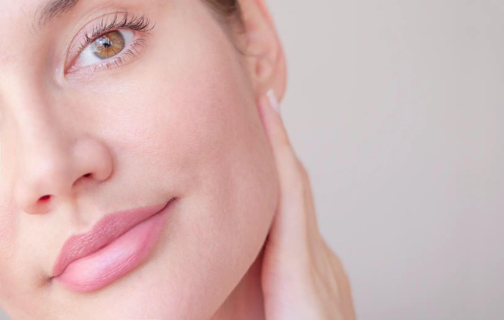 Close-up of a woman’s face with smooth and clear skin